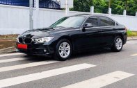 BMW 3 Series 320i 2017 - Cần bán Bmw 320i, SX 2017 ĐK 2018 màu đen giá 1 tỷ 380 tr tại Tp.HCM
