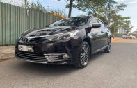 Toyota Corolla 1.8G 2018 - Cần bán Toyota Corolla 1.8G sản xuất năm 2018, màu đen giá 750 triệu tại Tp.HCM