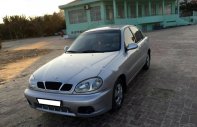 Daewoo Lanos SX 2001 - Cần bán lại xe Daewoo Lanos SX đời 2001, màu bạc giá 90 triệu tại Bình Dương