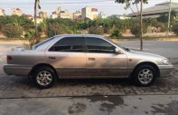 Toyota Camry  GLi 2001 - Cần bán Toyota Camry GLi 2001, màu bạc số sàn giá 250 triệu tại Hà Nội