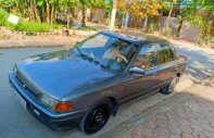 Mazda 323 1.6 MT 1996 - Cần bán Mazda 323 1.6 MT năm sản xuất 1996, màu xám  giá 65 triệu tại Hà Nam