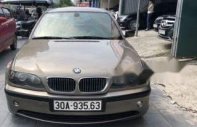 BMW 3 Series  325i  2005 - Cần bán BMW 3 Series 325i 2005, màu vàng, xe nhập giá 260 triệu tại Hà Nội