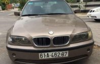 BMW i3 318i 2005 - Cần bán gấp BMW i3 318i sản xuất 2005, màu vàng giá cạnh tranh giá 210 triệu tại Tp.HCM