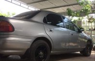 Mazda 323   2000 - Cần bán gấp Mazda 323 năm sản xuất 2000, màu bạc giá 100 triệu tại Khánh Hòa