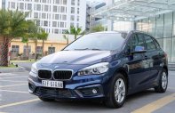 BMW 2 Series 218i Active 2015 - Cần bán xe BMW 2 Series 218i Active sản xuất 2015, xe gia đình, lanh lẹ gọn gàng, cốp rộng rãi giá 930 triệu tại Tp.HCM