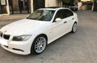 BMW 3 Series 320i 2007 - Cần bán xe BMW 320i 2007 màu trắng, nội thất kem giá 335 triệu tại Tp.HCM