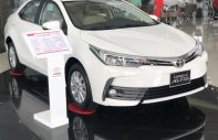 Toyota Corolla altis 1.8G AT 2019 - Toyota Corolla Altis năm 2019 màu trắng, 746 triệu giá 746 triệu tại Tiền Giang