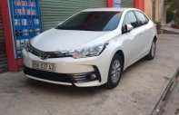 Toyota Corolla altis 1.8E 2017 - Bán xe Toyota Corolla altis 1.8E sản xuất 2017, màu trắng chính chủ, 690 triệu giá 690 triệu tại Cần Thơ