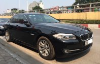 BMW 5 Series 520i 2013 - Cần bán lại xe BMW 5 Series 520i 2013, màu đen, xe nhập giá 1 tỷ 175 tr tại Hà Nội