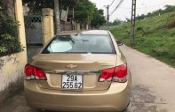 Chevrolet Cruze LS 2010 - Bán xe Chevrolet Cruze LS sản xuất 2010, màu vàng số sàn giá 295 triệu tại Hà Nội