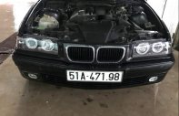 BMW 3 Series  320i 1997 - Bán ô tô BMW 3 Series 320i đời 1997, màu đen, xe nhập, 140 triệu giá 140 triệu tại Tp.HCM
