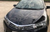 Toyota Corolla altis 2014 - Cần bán xe Toyota Corolla altis sản xuất năm 2014, màu đen giá 615 triệu tại Ninh Bình