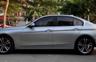 BMW 3 Series 320I 2014 - Bán BMW 320i Sportline 2014 màu bạc chính chủ giá 828 triệu tại Tp.HCM