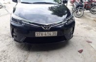 Toyota Corolla altis   2018 - Bán Toyota Corolla altis sản xuất năm 2018, màu đen, chính chủ giá 830 triệu tại Nghệ An
