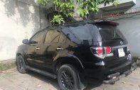 Toyota Fortuner  4x4 AT 2015 - Bán lại xe Toyota Fortuner 4x4 AT đời 2015, màu đen giá 770 triệu tại Hà Nội