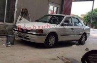 Mazda 323 MT 1997 - Cần bán Mazda 323 MT đời 1997, màu trắng giá 35 triệu tại Ninh Bình
