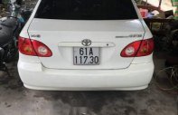 Gia đình bán Toyota Corolla altis sản xuất năm 2002, màu trắng giá 205 triệu tại Bình Dương