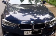 BMW 3 Series 320i 2015 - Bán BMW 320i sản xuất 2015, màu xanh đen, đi 36.000km, chính chủ bán giá 950 triệu tại Tp.HCM