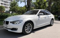 BMW 3 Series 320i 2014 - Bán BMW 320i sản xuất năm 2014, màu trắng, xe nhập giá 879 triệu tại Nghệ An
