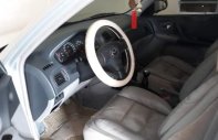 Mazda 323 2003 - Cần đổi xe tự động bán Mazda 323 đời 2003, màu bạc giá 180 triệu tại Nghệ An