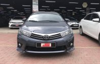 Toyota Corolla altis 2.0V 2014 - Cần bán gấp Toyota Corolla altis 2.0V đời 2014, màu xanh lam số tự động giá cạnh tranh giá 700 triệu tại Tp.HCM