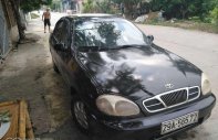 Daewoo Lanos MT 2001 - Cần bán lại xe Daewoo Lanos MT sản xuất 2001, màu đen giá 47 triệu tại Ninh Bình