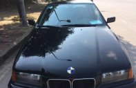 BMW 3 Series  320i  1996 - Bán xe nhập khẩu BMW 3 Series sản xuất 1995 màu đen giá 68 triệu tại Tp.HCM