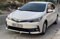 Lên đời bán xe Toyota Corolla altis năm 2018, màu trắng giá 650 triệu tại Cần Thơ