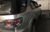 Toyota Fortuner G 2014 - Bán Toyota Fortuner G sản xuất năm 2014, màu bạc, gia đình sử dụng kỹ giá 715 triệu tại Tp.HCM