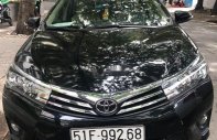 Cần bán xe Toyota Corolla altis 1.8 đời 2015, màu đen, nhập khẩu, xe nguyên bản giá 650 triệu tại Tp.HCM