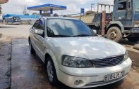 Ford Laser     2004 - Bán Ford Laser năm sản xuất 2004, màu trắng, nhập khẩu nguyên chiếc giá 200 triệu tại Tây Ninh