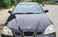 Daewoo Lacetti EX 2005 - Nhà bán Daewoo Lacetti EX đời 2005, màu đen số sàn giá 125 triệu tại Bắc Ninh