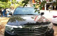 Toyota Fortuner 2013 - Gia đình bán xe Toyota Fortuner sản xuất 2013, màu nâu giá 650 triệu tại Phú Yên