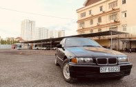 BMW 3 Series 320i 1995 - Bán BMW 320i sản xuất 1995, màu đen, nhập khẩu giá 120 triệu tại Tp.HCM