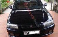 Mazda 323 2000 - Cần bán xe Mazda 323 năm 2000, màu đen chính chủ, giá 70tr giá 70 triệu tại Ninh Bình