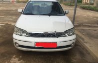 Ford Laser Delu 1.6 MT 2002 - Bán Ford Laser Delu 1.6 MT sản xuất 2002, màu trắng giá 135 triệu tại Thanh Hóa