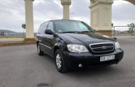 Kia Carnival 2.4 2009 - Bán Kia Carnival 2.4 sản xuất năm 2009, màu đen xe gia đình, 245tr giá 245 triệu tại Hải Dương