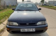 Toyota Corolla 1996 - Cần bán gấp Toyota Corolla sản xuất năm 1996, màu đen, nhập khẩu chính hãng giá 98 triệu tại Ninh Bình