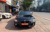 BMW 3 Series 320i 2012 - Cần bán gấp BMW 3 Series 320i sản xuất năm 2012, màu đen, xe nhập, giá tốt giá 730 triệu tại Hà Nội