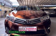 Toyota Corolla   2016 - Cần bán Toyota Corolla sản xuất 2016, màu nâu như mới giá 630 triệu tại Hà Nội