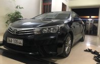 Toyota Corolla 2015 - Cần bán lại xe Toyota Corolla sản xuất năm 2015, màu đen xe gia đình, giá 519tr giá 519 triệu tại Hải Dương