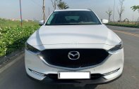 Mazda CX 5 2018 - Cần bán gấp Mazda CX 5 năm sản xuất 2018, màu trắng xe gia đình giá 929 triệu tại Bình Dương