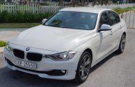 BMW 3 Series 320i  2013 - Cần bán gấp BMW 3 Series 320i năm sản xuất 2013, màu trắng, nhập khẩu nguyên chiếc chính chủ, giá tốt giá 815 triệu tại Hà Nội