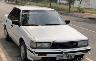 Nissan Bluebird 1.8   1990 - Cần bán Nissan Bluebird 1.8 đời 1990, màu trắng, xe nhập số sàn giá 18 triệu tại Tp.HCM