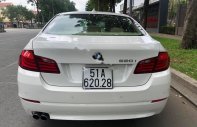 BMW 5 Series 520i 2013 - Bán xe BMW 5 Series 520i sản xuất năm 2013, màu trắng, xe nhập, giá tốt giá 979 triệu tại Tp.HCM