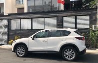 Mazda CX 5 2015 - Bán Mazda CX 5 sản xuất 2015, màu trắng xe gia đình giá 675 triệu tại Tp.HCM