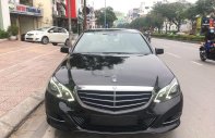 Mercedes-Benz E class  E200  2014 - Cần bán lại xe Mercedes E200 năm 2014, màu đen giá 1 tỷ 15 tr tại Hà Nội