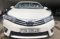 Toyota Corolla 2015 - Cần bán gấp Toyota Corolla sản xuất năm 2015, màu trắng số tự động, 570 triệu giá 570 triệu tại Hà Nội