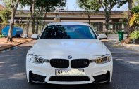 BMW 3 Series 2014 - Cần bán xe BMW 3 Series sản xuất 2014, màu trắng, nhập khẩu nguyên chiếc giá cạnh tranh giá 920 triệu tại Tp.HCM