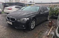 BMW 3 Series   2015 - Bán ô tô BMW 320i sản xuất 2015, màu đen, form 2016 giá 945 triệu tại Hà Nội